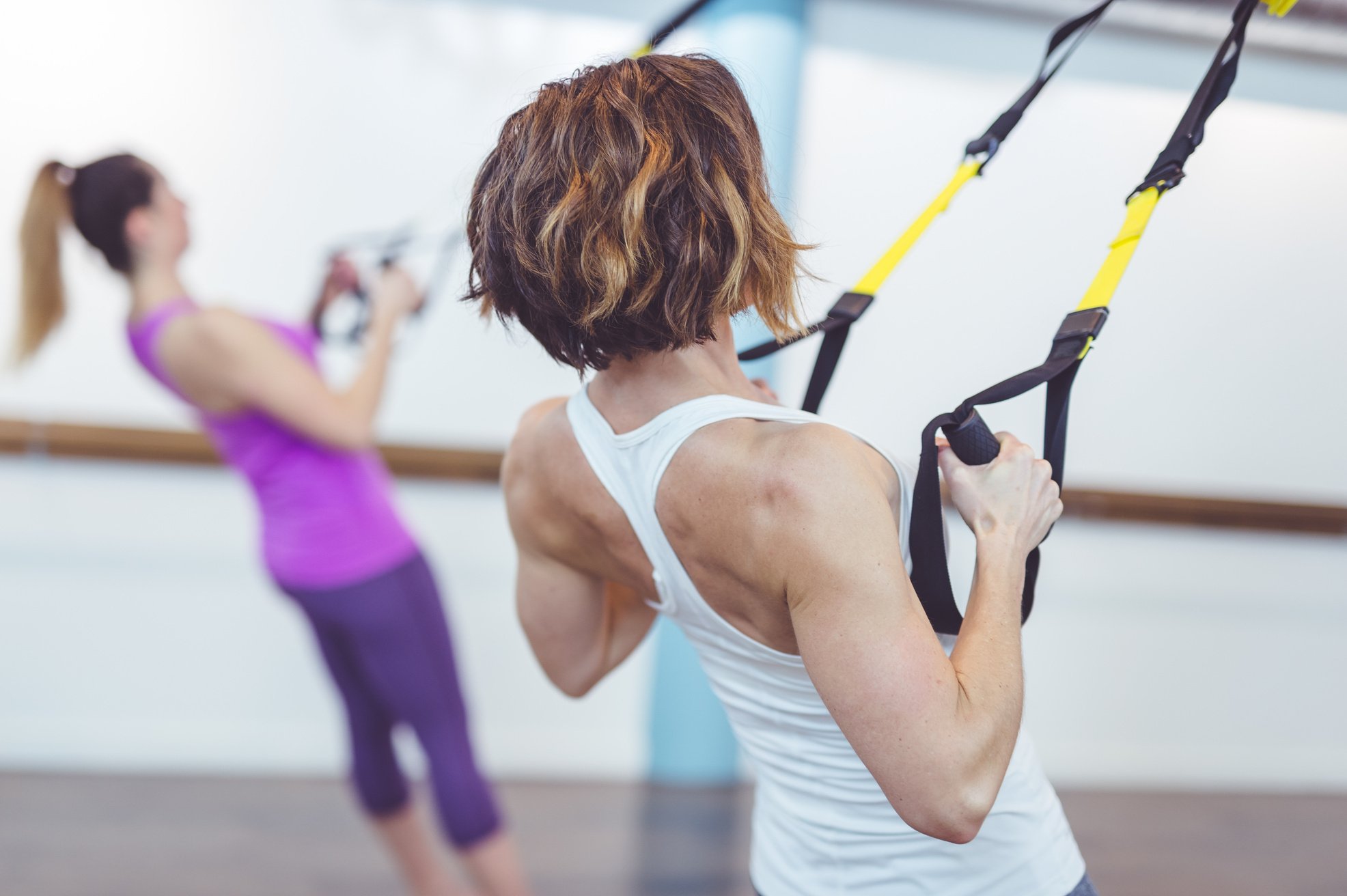 Women Doing Barre + TRX Workout